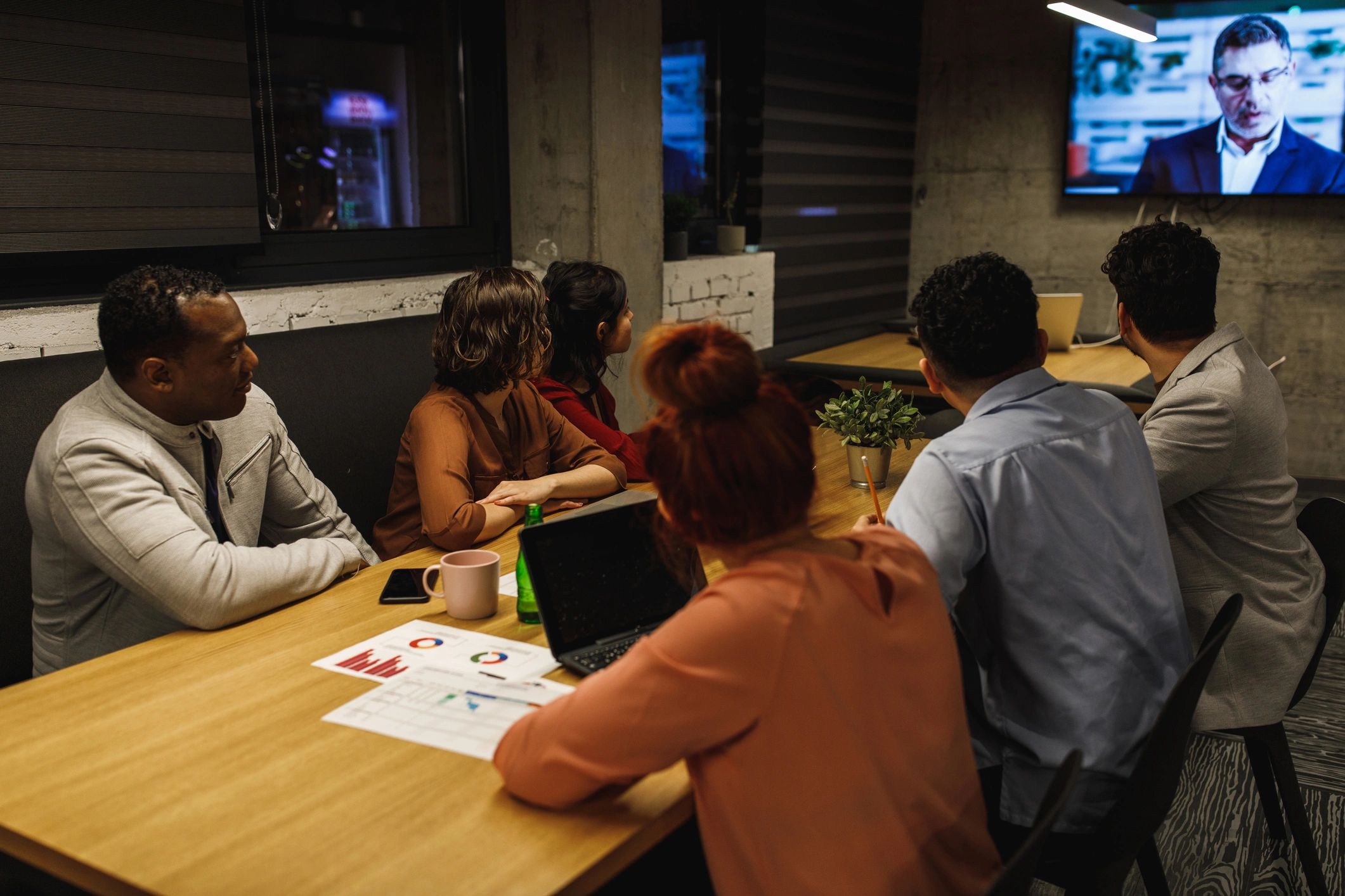 Professionals reviewing financing options together