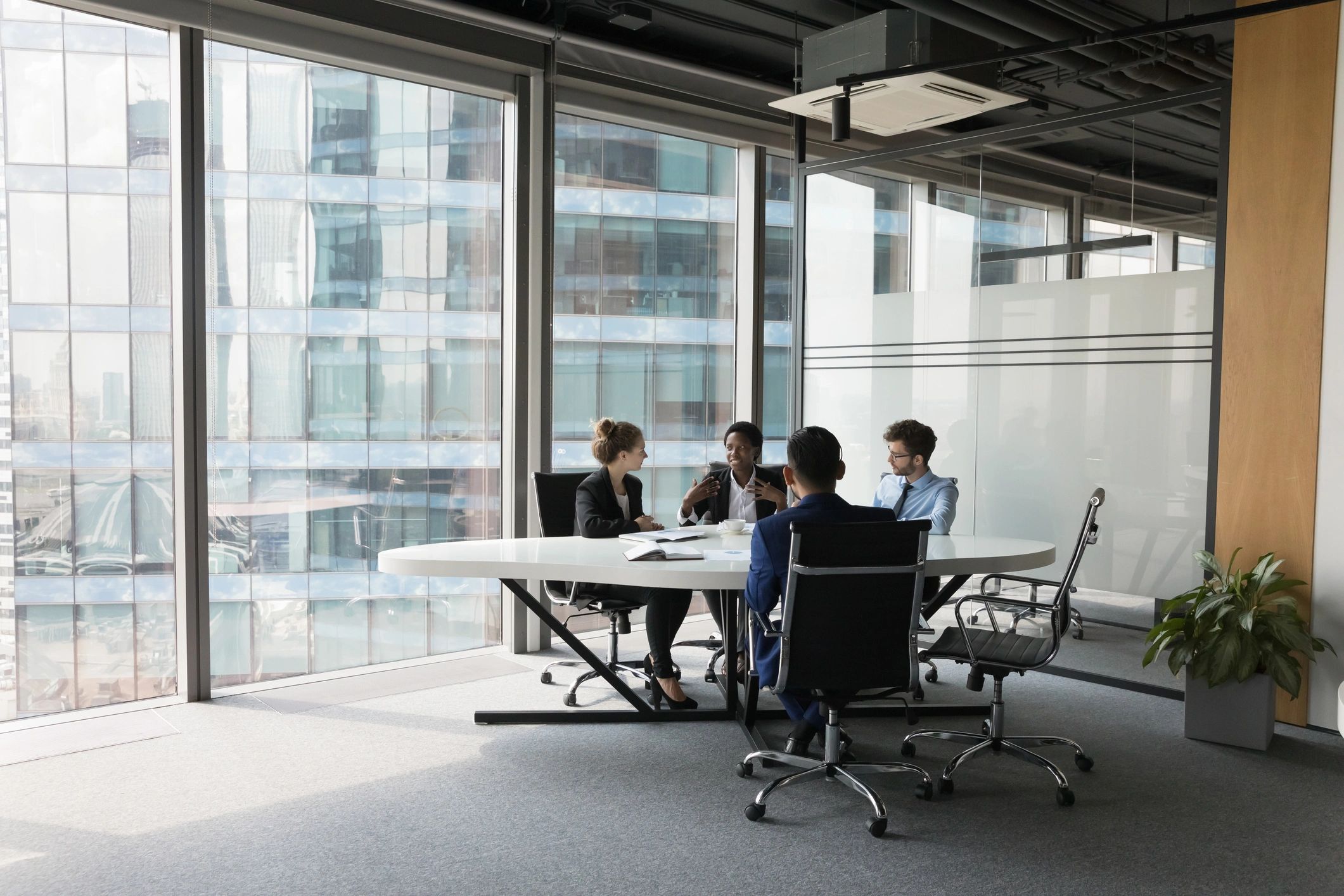 Diverse business team in a meeting room discussing strategy