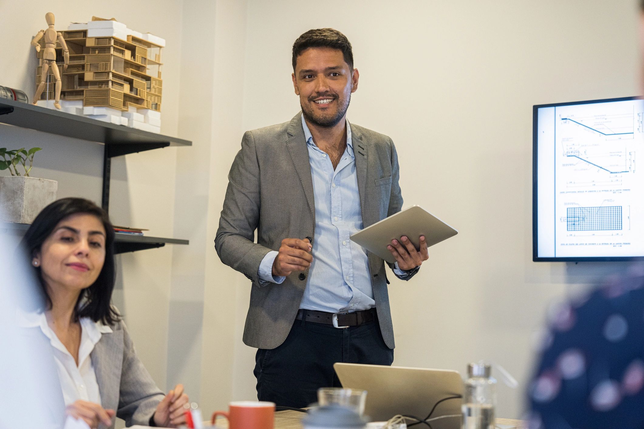 Business professional in discussion with investors