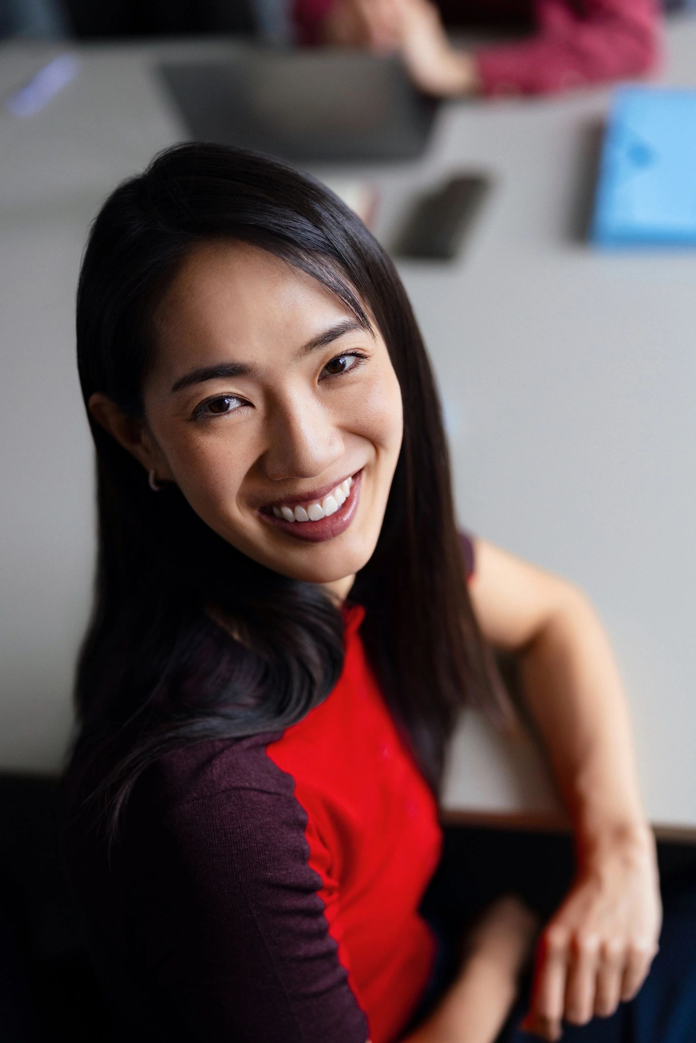 Smiling business woman portrait in office meeting