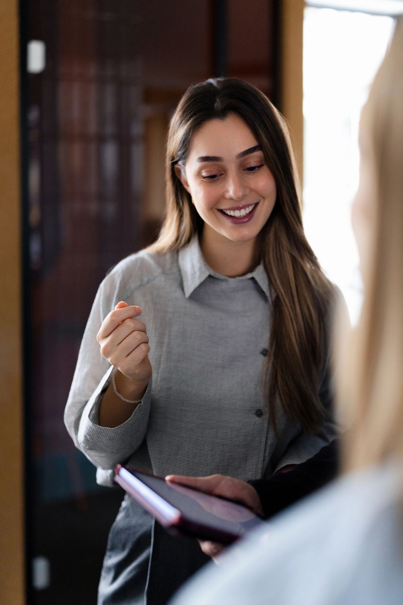Businesswoman discussing a project with a colleague